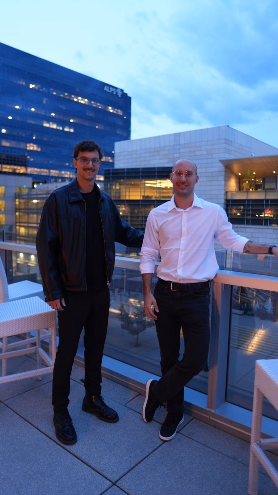 Marcos Stubrin and David Moreira on a rooftop terrace